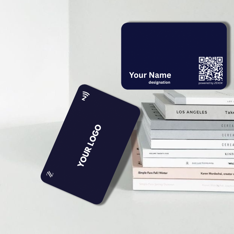 Two dark blue business cards with customizable text on a white surface.